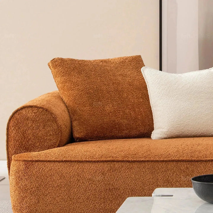 Minimalist teddy fabric 4 seater sofa elegant in still life.