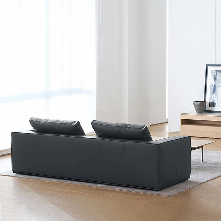 Minimalist fabric 2 seater sofa como in still life.
