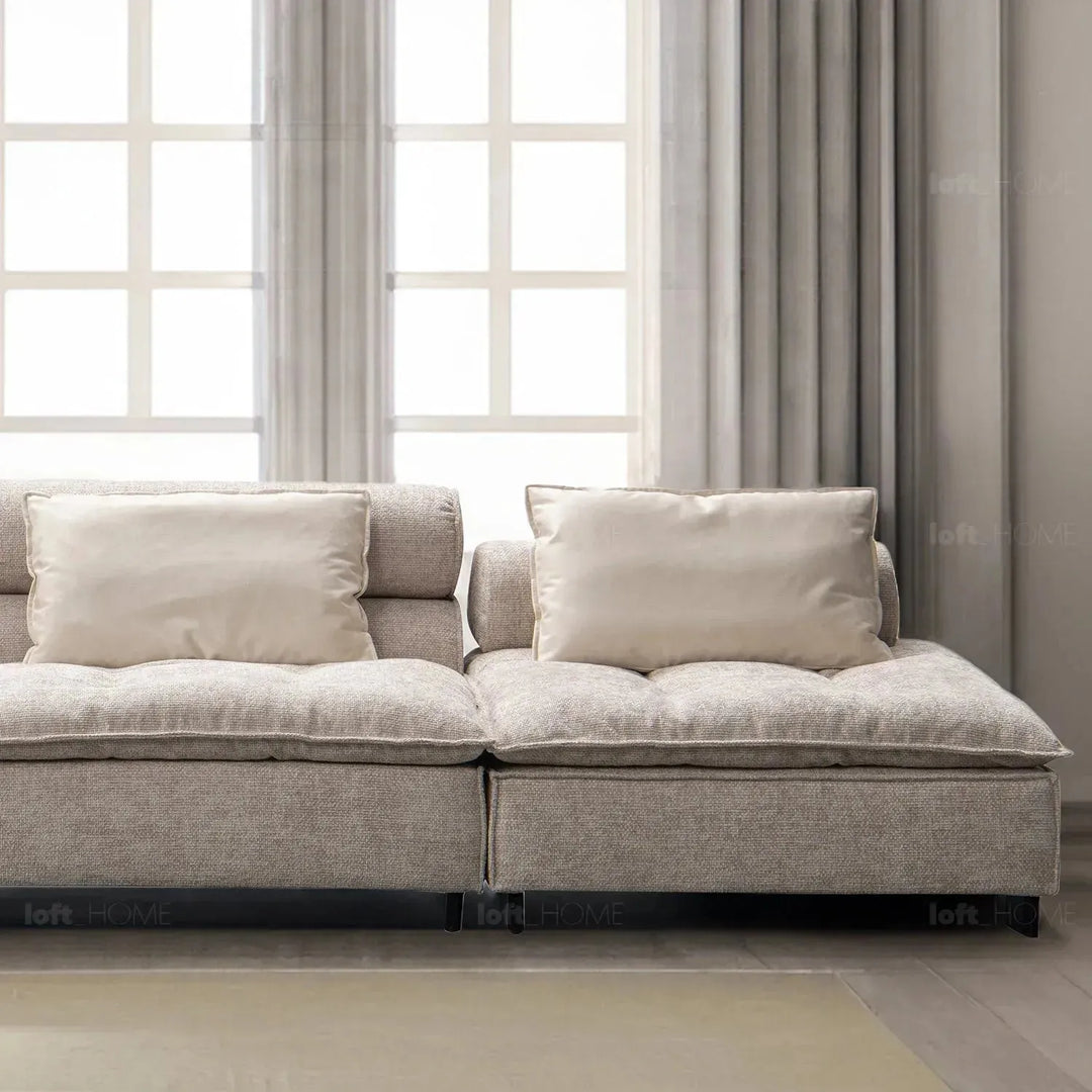 Modern mixed weave fabric 5 seater sofa aumn in close up details.
