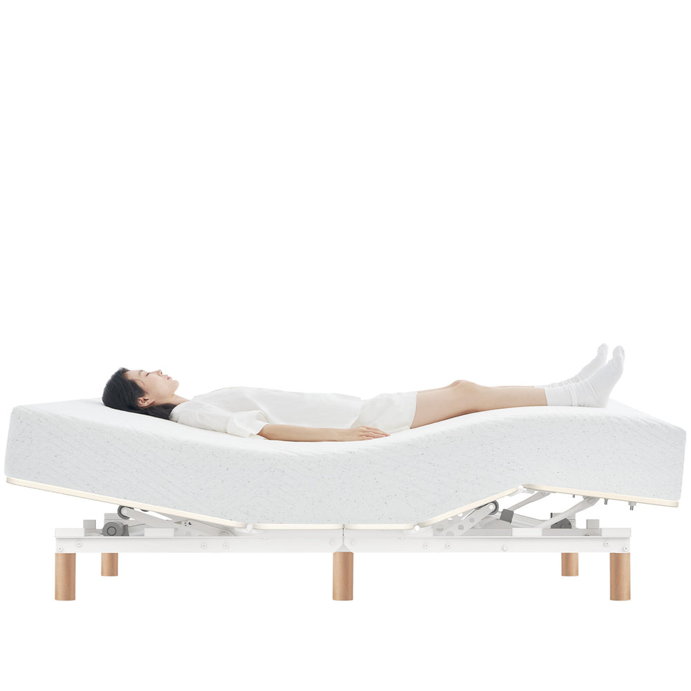 Minimalist metal electric adjustable bed frame with mattress 2in1 set upone in white background.