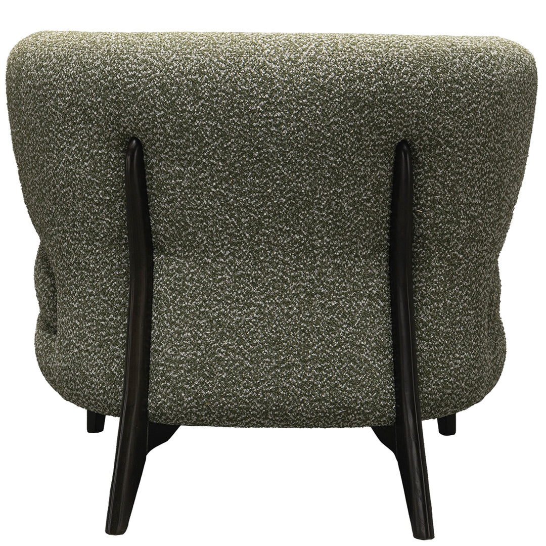 Cream boucle fabric 1 seater sofa moss in still life.