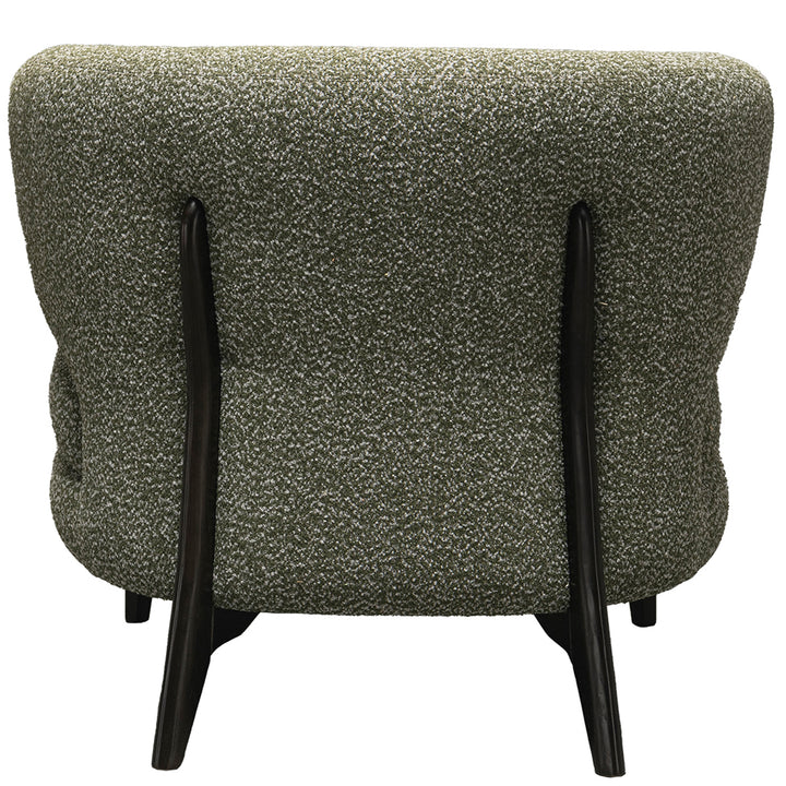 Cream boucle fabric 1 seater sofa moss in still life.