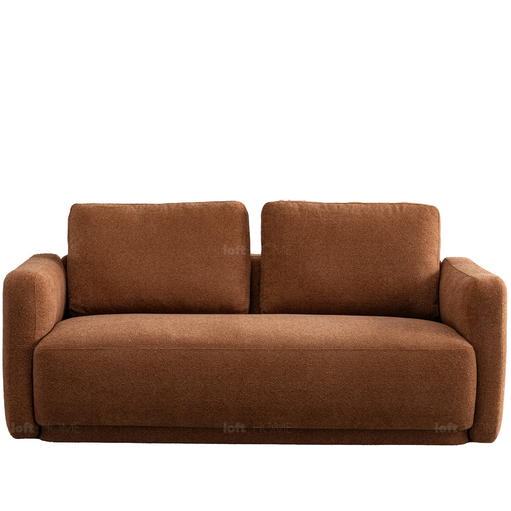 Modern boucle fabric 2 seater sofa rusty in white background.