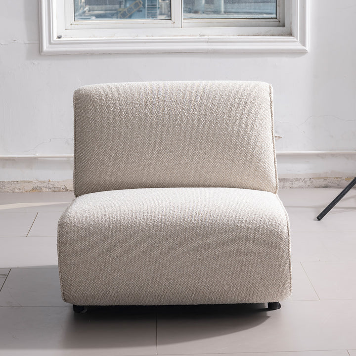 Minimalist boucle fabric modular 4 seater sofa colle in still life.