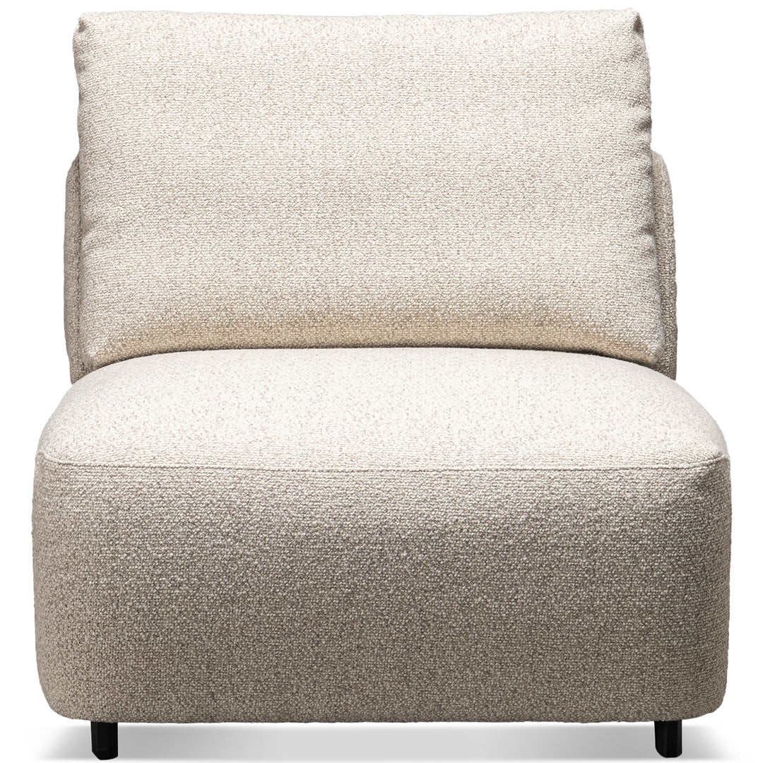 Cream boucle fabric modular armless 1 seater sofa serene in white background.