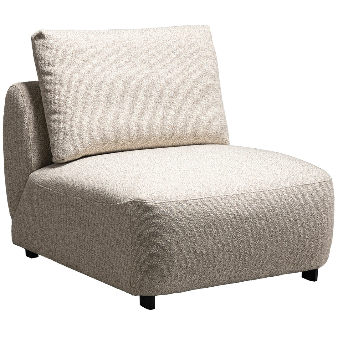Cream boucle fabric modular armless 1 seater sofa serene in still life.