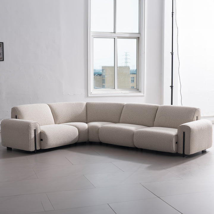 Minimalist boucle fabric modular l shape sectional sofa colle 4+l material variants.