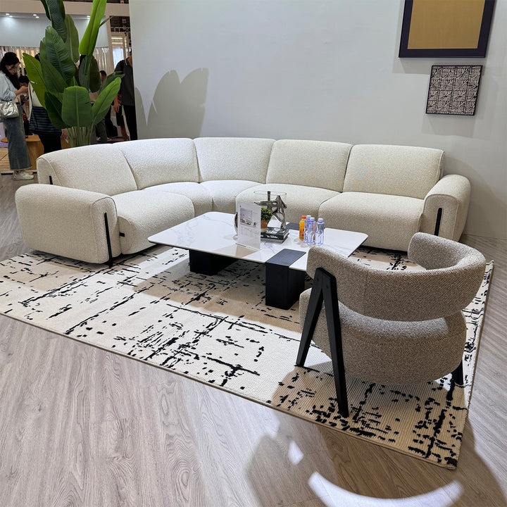 Minimalist boucle fabric modular l shape sectional sofa colle 4+l in real life style.