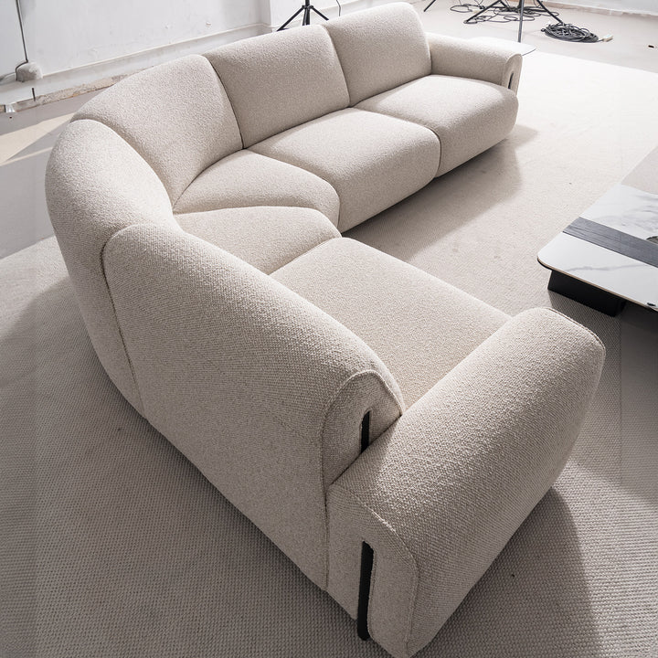 Minimalist boucle fabric modular l shape sectional sofa colle 4+l in close up details.