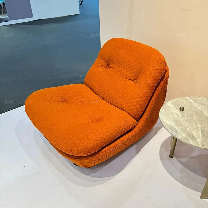 Cream chenille velvet fabric rocking 1 seater sofa nebula in real life style.
