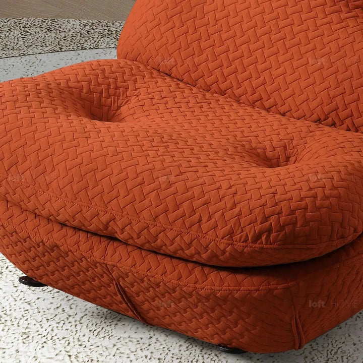 Cream chenille velvet fabric rocking 1 seater sofa nebula with context.