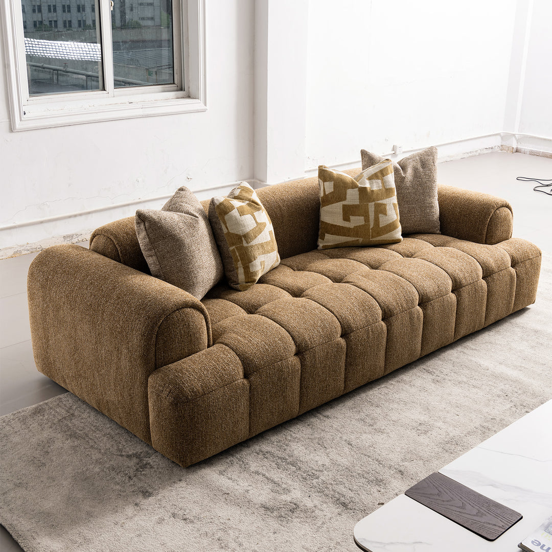 Modern mixed weave fabric 3 seater sofa puff color swatches.