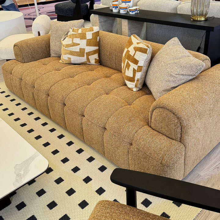 Modern mixed weave fabric 3 seater sofa puff in real life style.