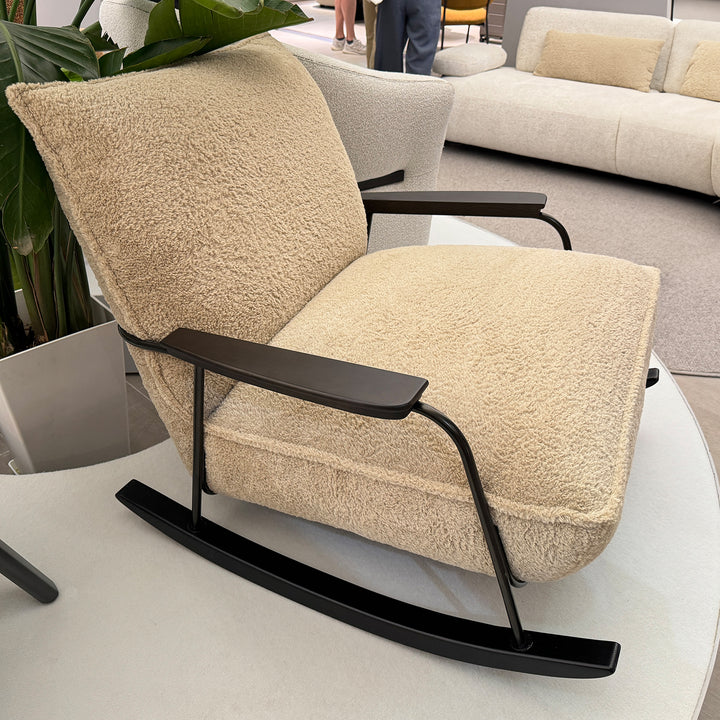 Cream sherpa fabric rocking chair 1 seater sofa cloudy in panoramic view.