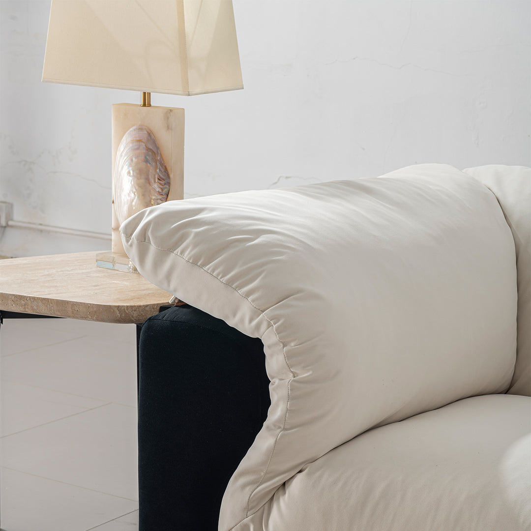 Cream suede fabric 2 seater sofa camellia in details.