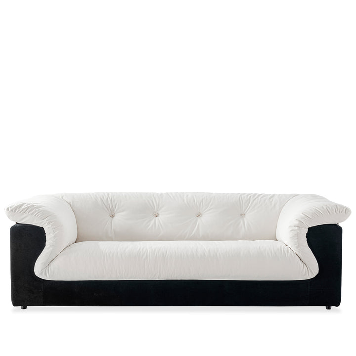 Cream suede fabric 3 seater sofa camellia in white background.