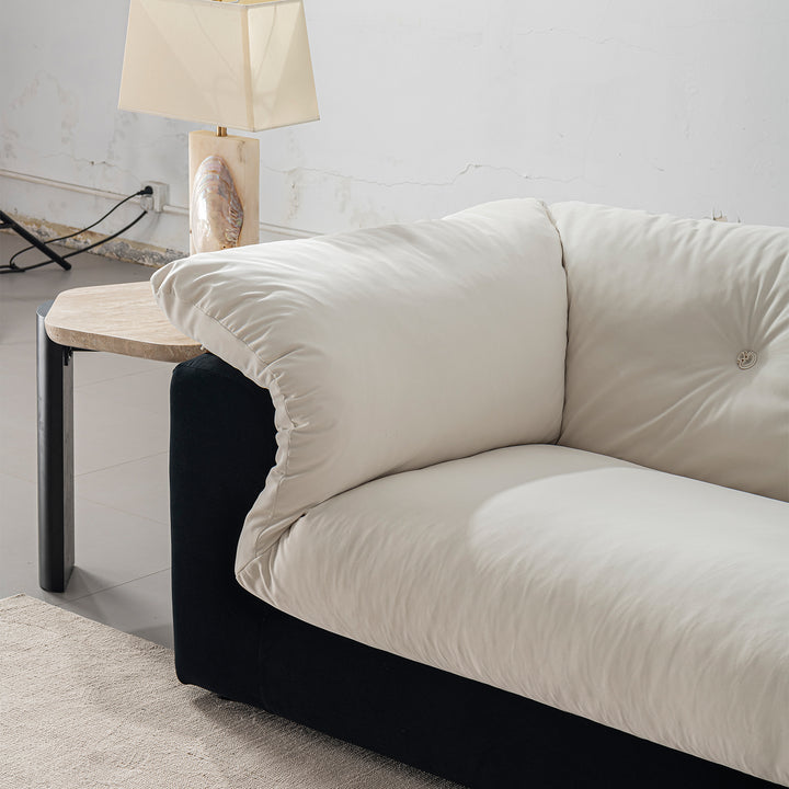 Cream suede fabric 3 seater sofa camellia in close up details.