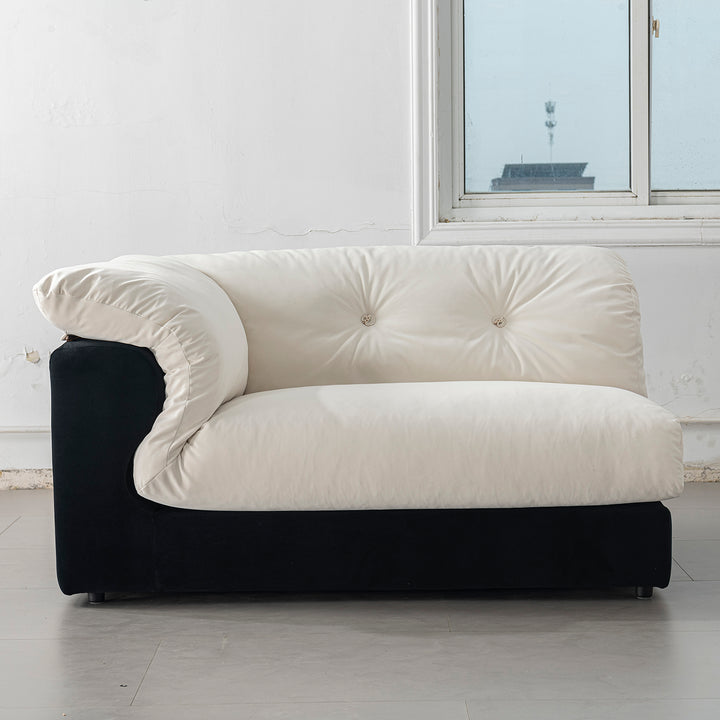 Cream suede fabric 4 seater sofa camellia in panoramic view.