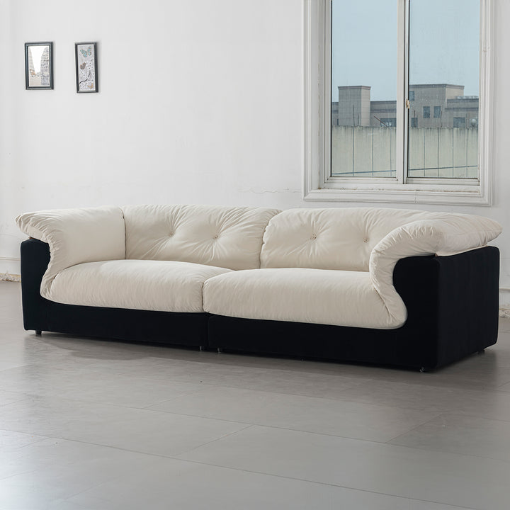 Cream suede fabric 4 seater sofa camellia in close up details.