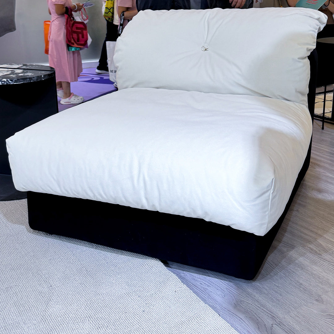 Cream suede fabric armless 1 seater sofa camellia material variants.