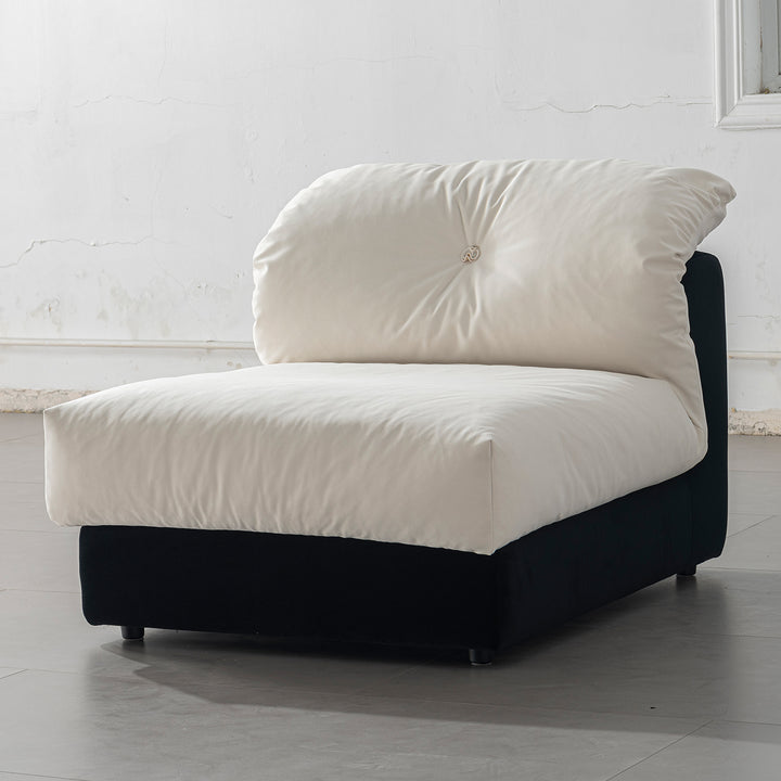 Cream suede fabric armless 1 seater sofa camellia in details.
