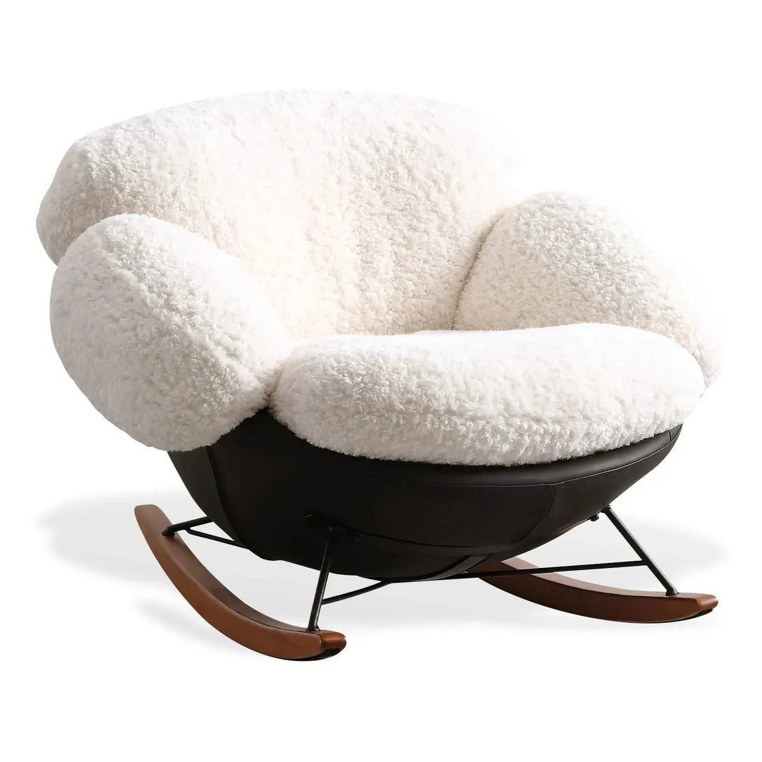 Cream teddy fabric rocking 1 seater sofa swank in white background.