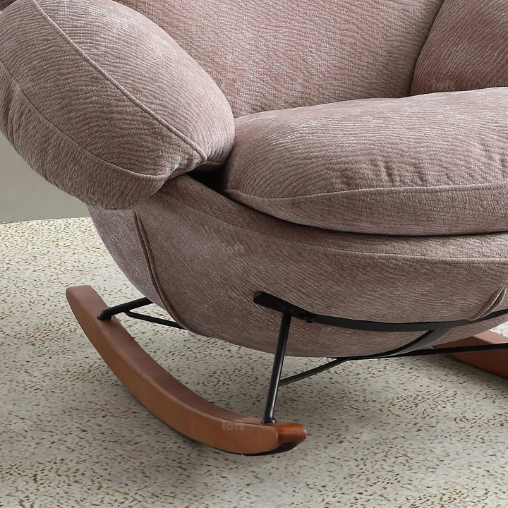 Cream teddy fabric rocking 1 seater sofa swank in close up details.