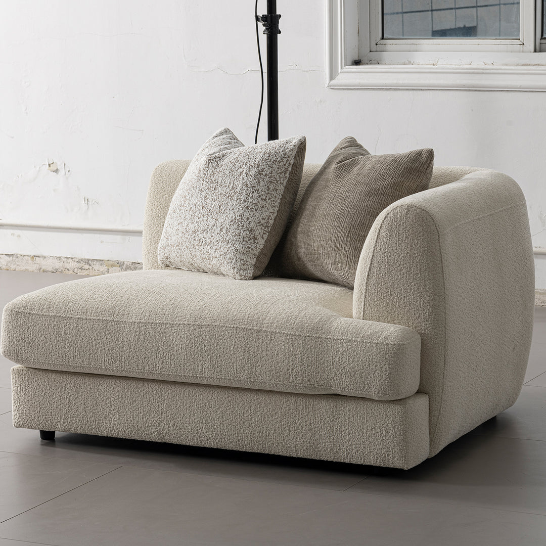 Minimalist velvet fabric modular 3 seater sofa fable in close up details.