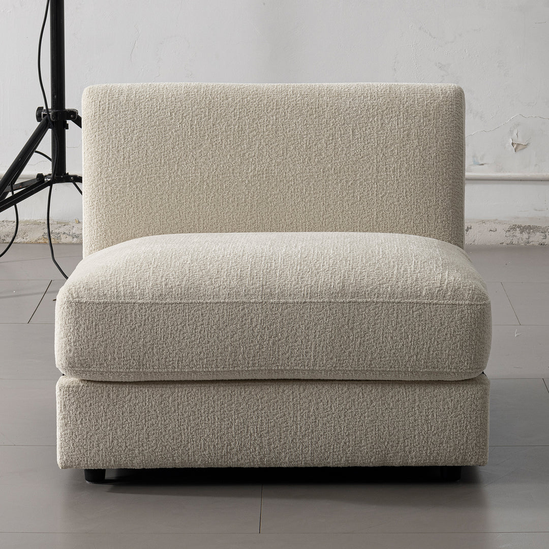 Minimalist velvet fabric modular armless 1 seater sofa fable with context.