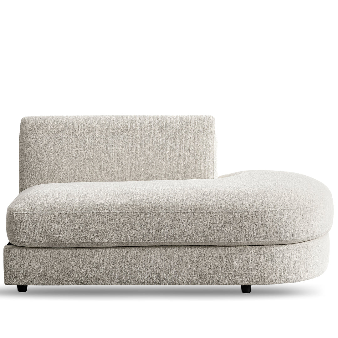 Minimalist velvet fabric modular chaise 2 seater sofa fable in still life.