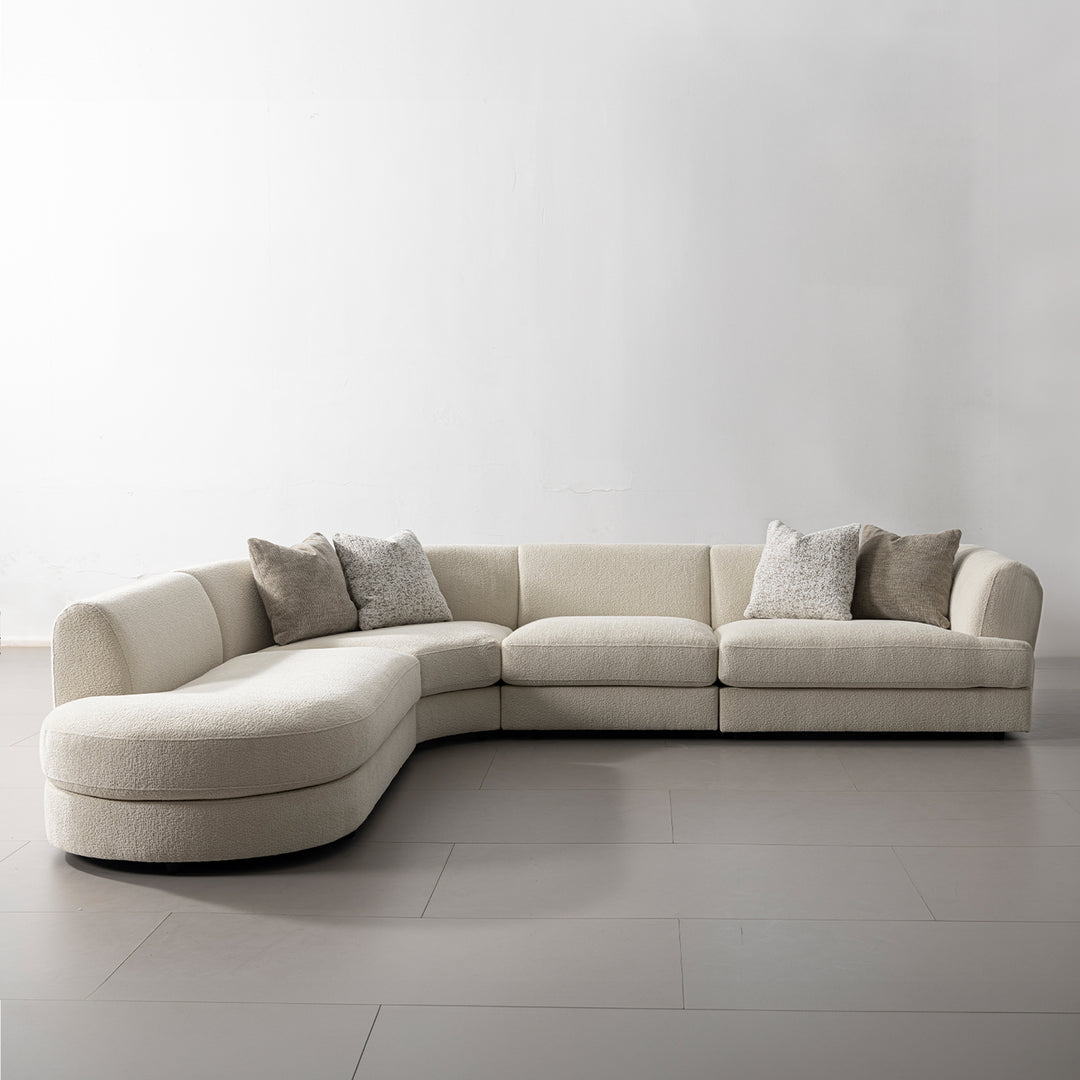 Minimalist velvet fabric modular chaise 2 seater sofa fable in panoramic view.
