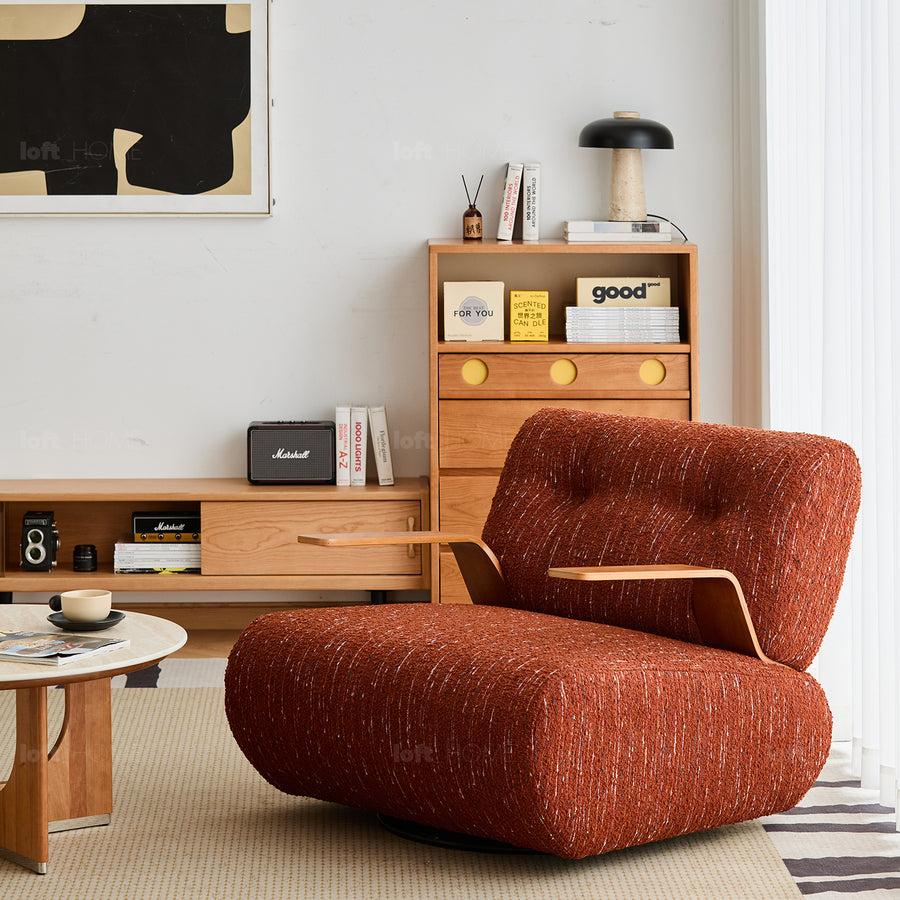 Modern mixed weave fabric revolving 1 seater sofa benny in panoramic view.