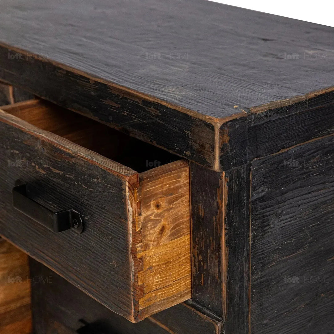 Rustic pine wood drawer cabinet relics in details.