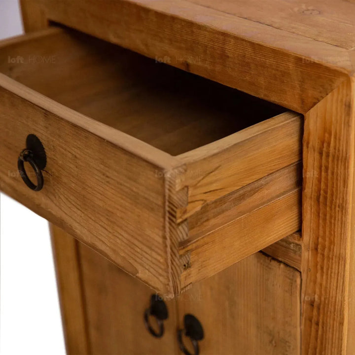 Rustic pine wood storage drawer cabinet tranquility in close up details.