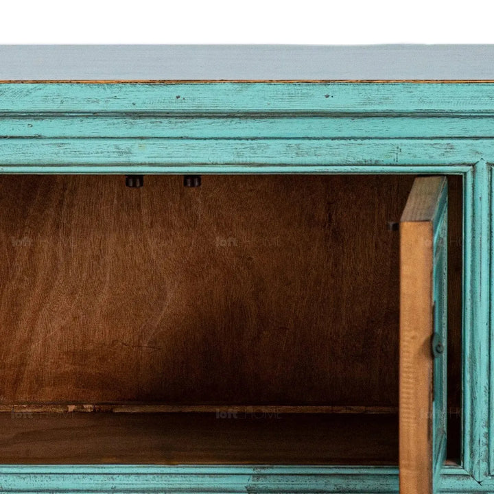 Rustic pine wood tv console whispers in panoramic view.