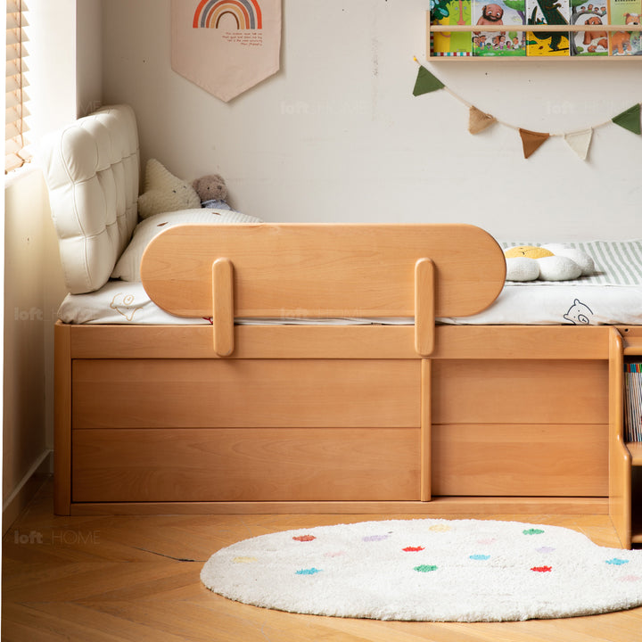 Scandinavian beech wood kids storage bed tidy in close up details.