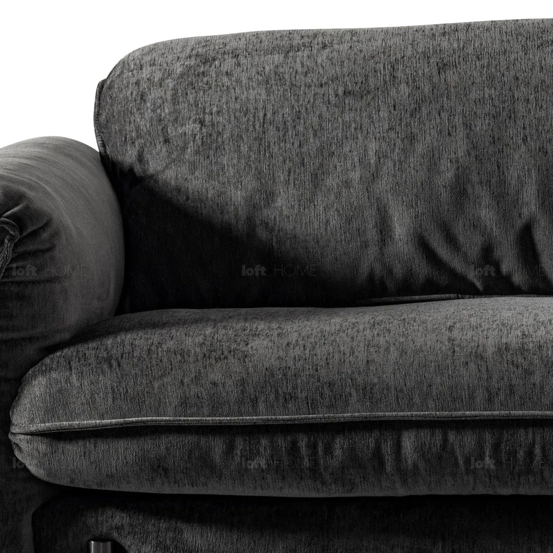 Modern chenille velvet fabric 3 seater sofa dushein in close up details.