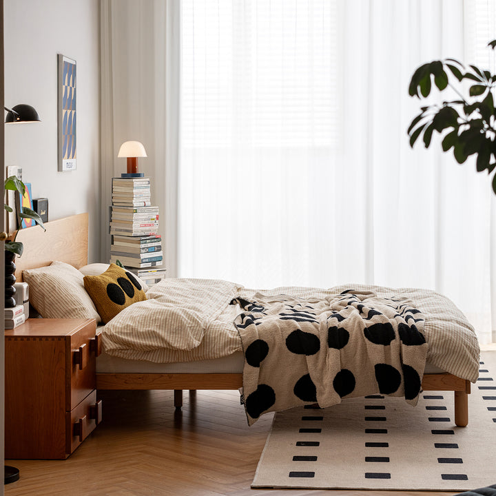 Scandinavian cherry wood bed isle in real life style.