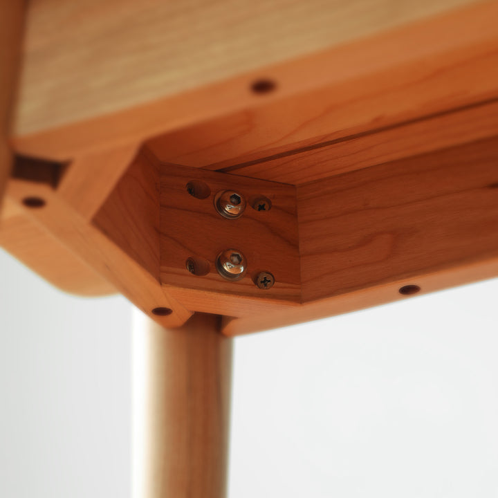 Scandinavian cherry wood dining bench green color swatches.