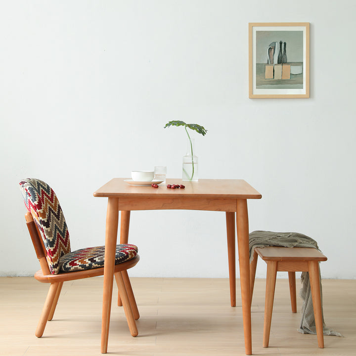 Scandinavian cherry wood dining bench green in real life style.