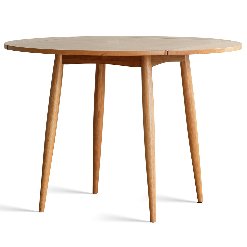 Scandinavian cherry wood extendable round dining table greekn in white background.