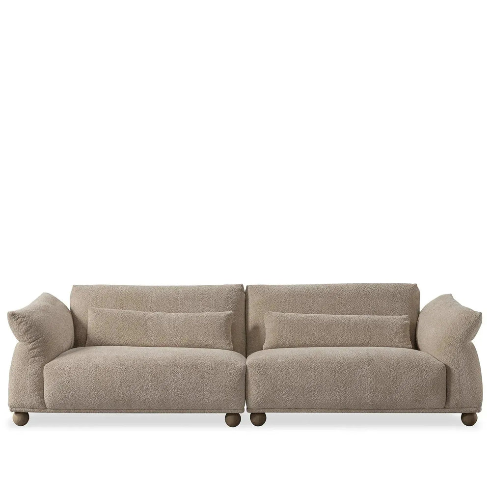 Cream fabric 4 seater sofa fondue in white background.