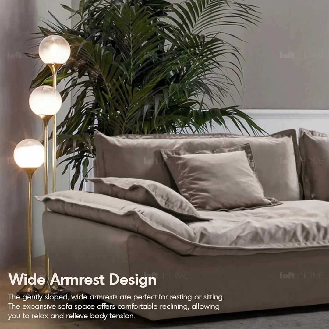 Contemporary fabric 5 seater sofa snuggle in close up details.