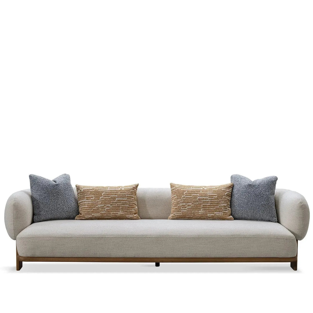 Scandinavian fabric 4 seater sofa waltz in white background.
