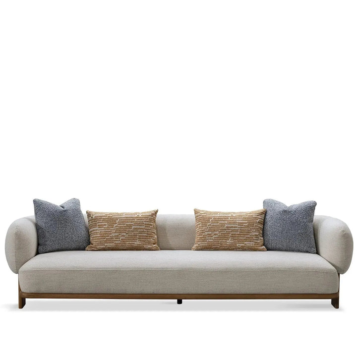 Scandinavian fabric 4 seater sofa waltz in white background.