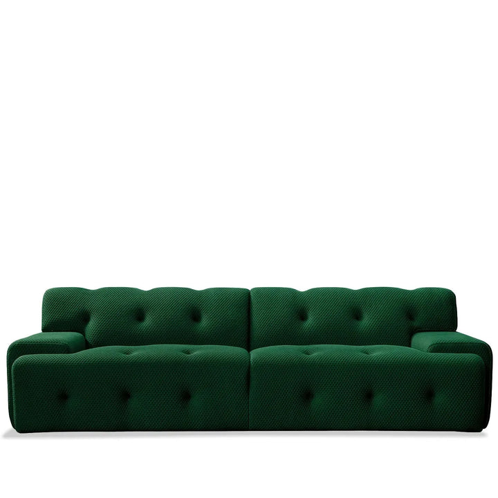 Contemporary fabric 4 seater sofa blogger in white background.