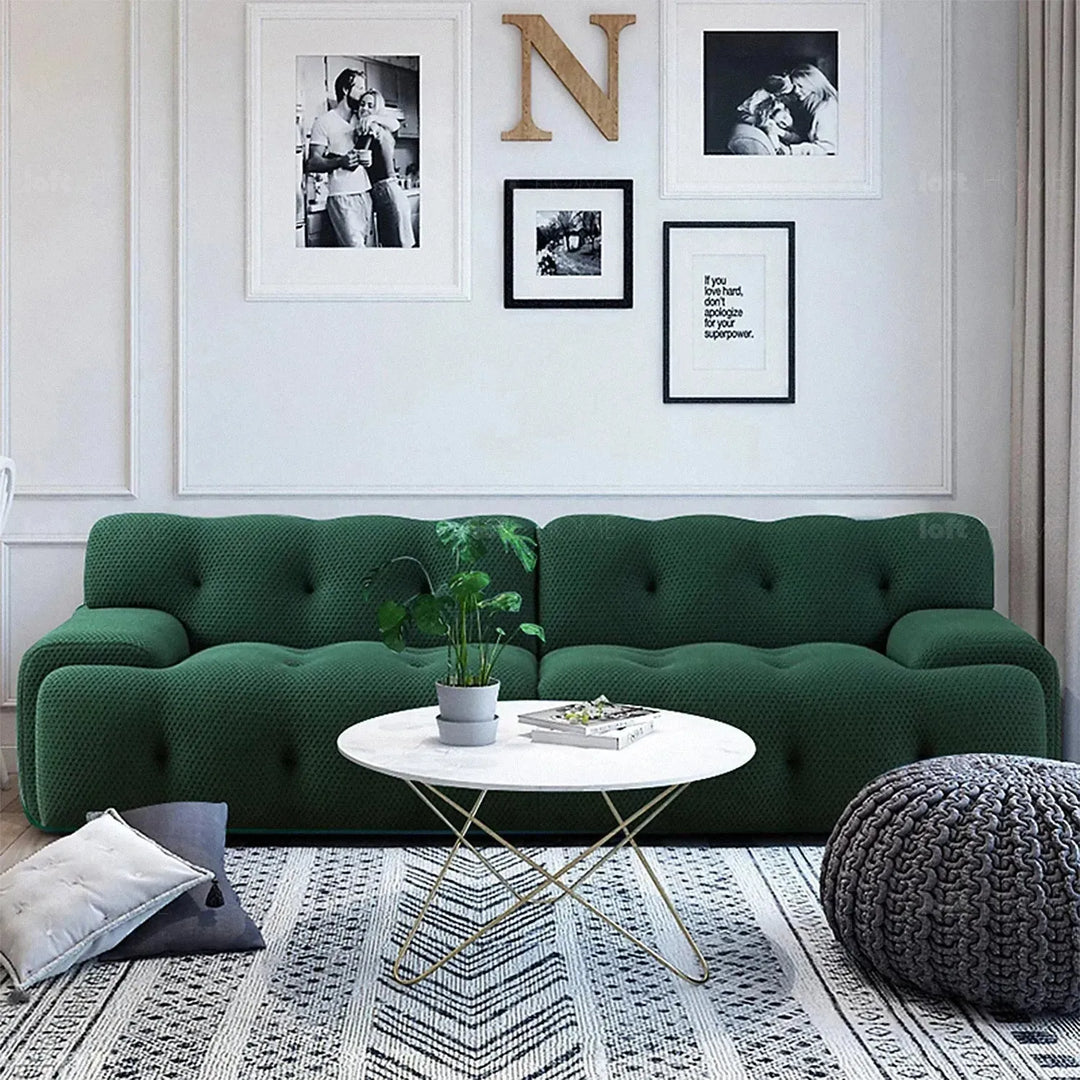Contemporary fabric 4 seater sofa blogger in panoramic view.