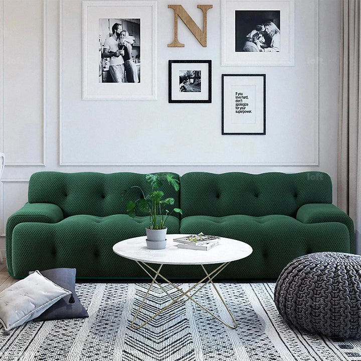 Contemporary fabric 4 seater sofa blogger in panoramic view.