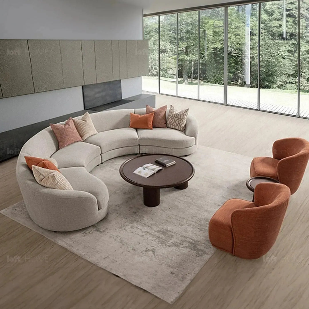 Cream fabric modular 4 seater sofa groove in panoramic view.