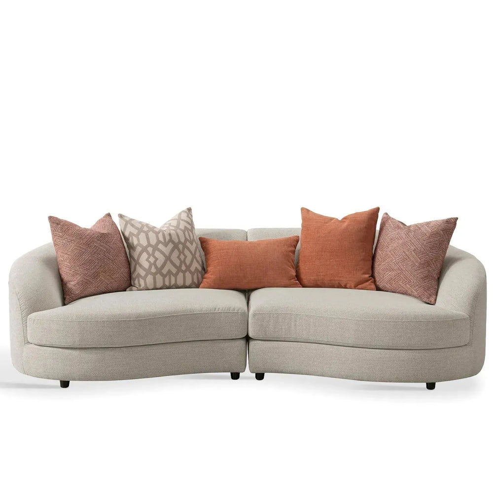 Cream fabric modular 4 seater sofa groove in white background.
